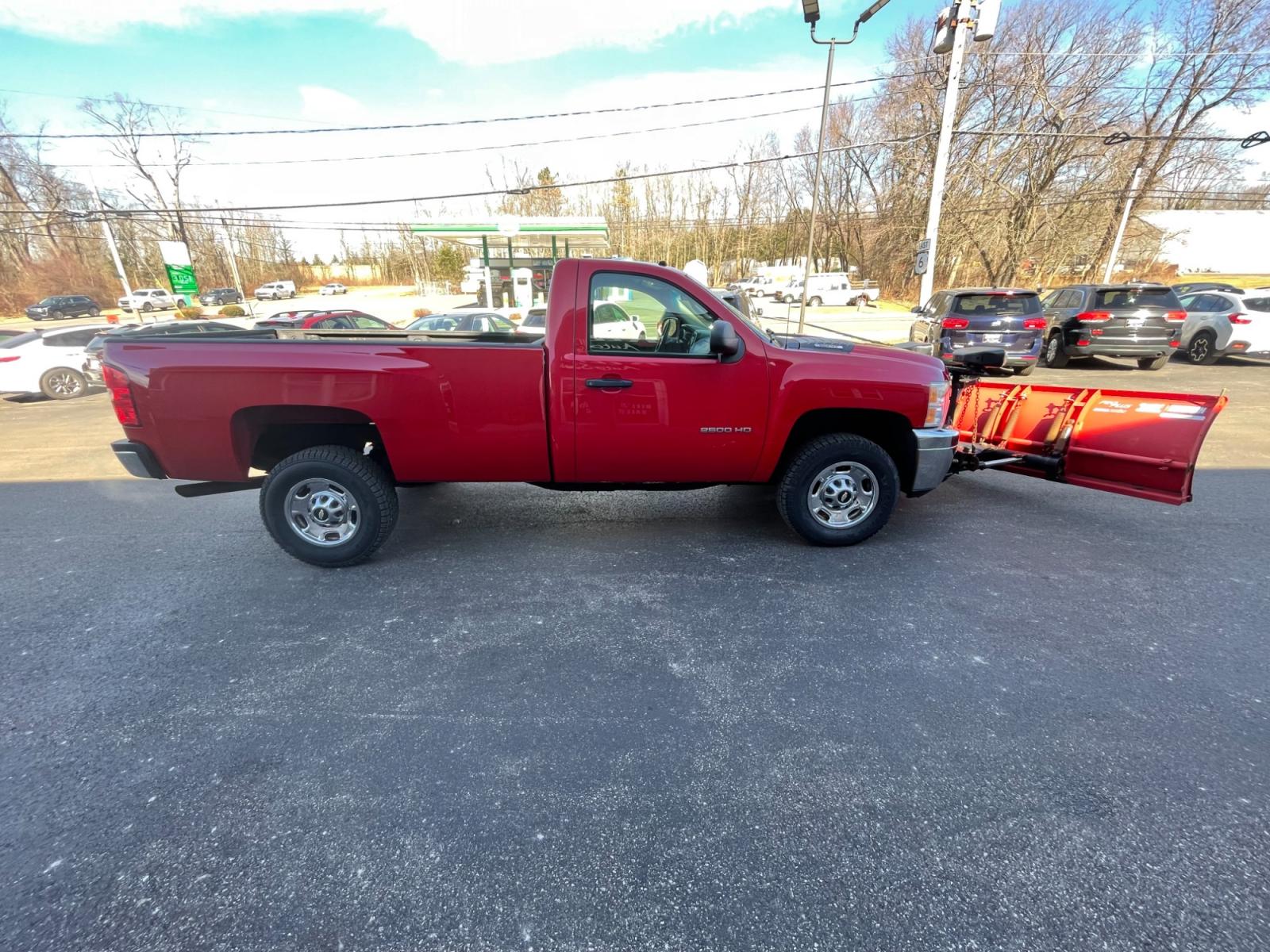 2011 Red /Black Chevrolet Silverado 2500HD Work Truck Long Box 4WD (1GC0KVCG8BF) with an 6.0L V8 OHV 16V FFV engine, 6-Speed Automatic transmission, located at 11115 Chardon Rd. , Chardon, OH, 44024, (440) 214-9705, 41.580246, -81.241943 - This 2011 Chevrolet Silverado 2500 Work Truck with a Regular Cab featuring a 6.0L Vortec V8 and a 6-speed transmission is a robust and versatile pickup designed for heavy-duty tasks. Its significant powertrain is well-suited for towing and hauling heavy loads, making it an ideal choice for work in c - Photo #8